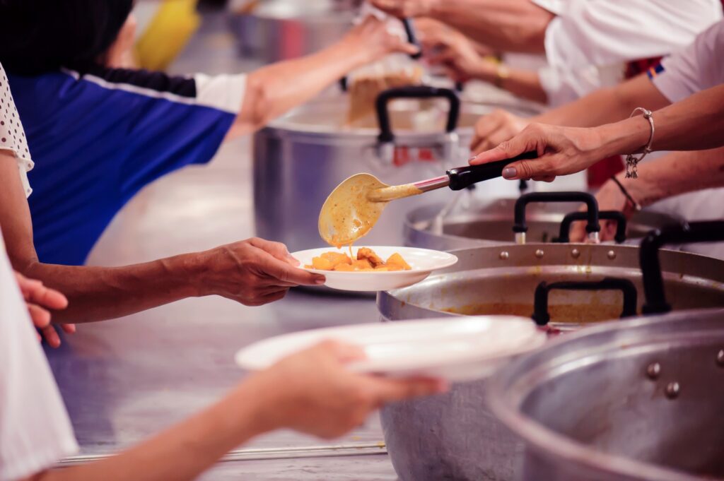 Food bank volunteers - Local Home Builder Invested in Our Communities in Greenville, Asheville Charleston & Bluffton